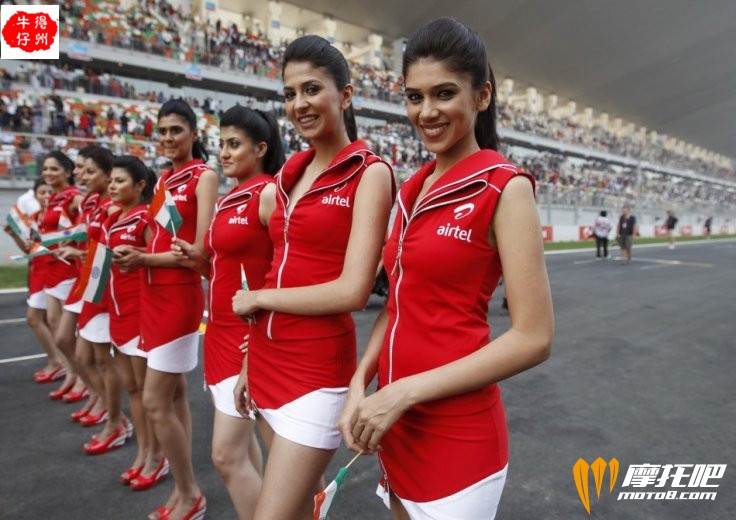 f1-grid-girls-pose-before-the-indian-first-formula-one-grand-prix-at-the-buddh-i.jpg